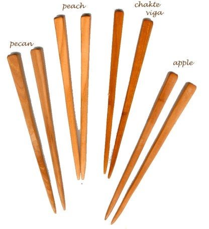 Pair of wooden chopstick bun holders by Designs by Baerreis